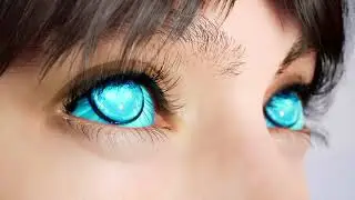 Cute girl with blue cybernetic eyes close-up. Macro shot of blue cyber eyes.