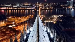 Daredevil Climbs Cologne Cathedral At Night