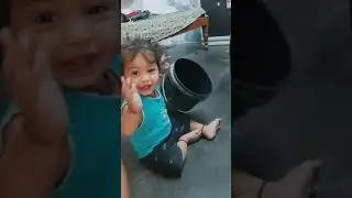My nephew playing with bucket in a funny way cute baby boy