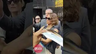 Halle Berry Wears A Pinstripe Jumpsuit Outside GMA As She Signs Autographs In NYC