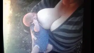 Breastfeeding on Demand:  Breastfeeding a newborn outside while Toddler wants to play!!!