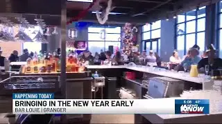 Bar Louie holds early New Year’s celebration