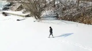 Double amputee walking on snow with Intuy Knee motorized knee prosthesis, 3km