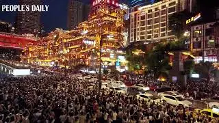 When lights flickered at Hongya Cave in Chongqing, illuminating the 11-story stilt building...