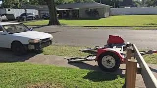 Loading my Camry wagon onto my car dolly!