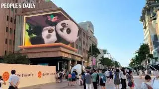 3D digital billboards at Wangfujing pedestrian street in Beijing never fail to entertain passersby