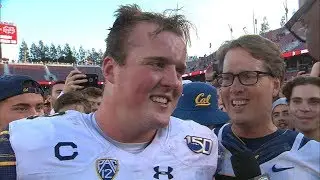 Cal captain Evan Weaver celebrates with his dad after beating Stanford