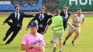 Storming the field during a game WITH SECURITY to protect me