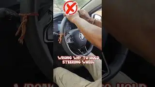 How to hold steering wheel in correct way