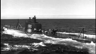 Men running to conning tower and going below in preparation for a dive at a USS S...HD Stock Footage