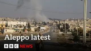 Russian strikes hit Aleppo as rebels take control of Syrian city | BBC News