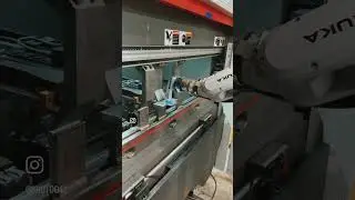 Automated press brake forming of sheet metal parts. #manufacturing #automation #robotics