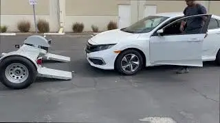 How to Load a Low Profile Car onto a Car Tow Dolly