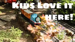 Model trains in a botanical garden