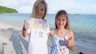 Children painting on the beach 4K