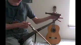Ocarina of Time Opening Theme, but on a Hacksaw (and Guitar)