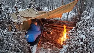 Winter Camping in Snow Storm with Survival Shelter & Bushcraft Cot.