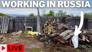 American Working On Building A House In Russia