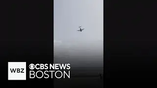 Video shows low-flying military plane over Plymouth Harbor