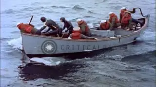 Training on use of a motor whale boat and rescue crew to rescue a downed US Navy ...HD Stock Footage