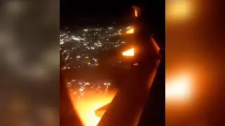 Flight forced to make emergency landing after flames seen shooting from the engine | SWNS