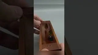 Gravity Trick - Can You Get Both Marbles In Each Hole!?