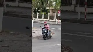 Motorcycles pulling out in Vietnam