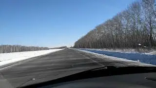 По трассе