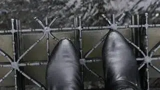 Boots on a bridge