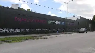 Powerful mural displaying names of gun violence victims painted in Wynwood