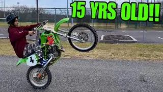 Teaching Little Brother How To Wheelie A Dirt Bike!! (KX-100)