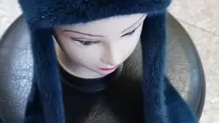 Женская шапка-ушанка из меха норки.