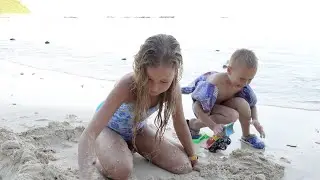 Children playing on the beach 4K