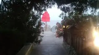 A quiet holiday in the Crimea among relict coniferous plants. Cozy village and boarding house.