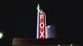 Fox theater's neon sign burns bright once again in Aurora