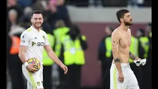 Leeds players salute the fans and ⁦ Mateusz Klich gives his away shirt