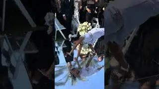 Flower Girl Backflips Down Aisle