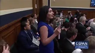 Auctioneer in Congress interrupts protester