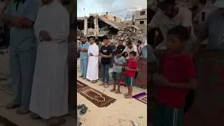 Palestinians in southern Gaza held Eid al-Adha prayers among the ruins of destroyed buildings.