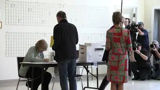 Liberal leader Mark Carney votes on election day in Canada | AFP