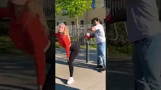 Bodybuilder tied the leg of girl and flashes the part