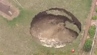 Giant Sinkhole Opens in Backyard