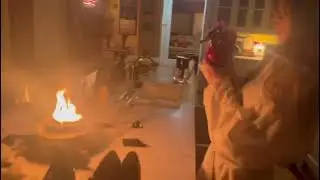 Taylor Swift with Gracie Abrams setting out a fire at her Tribeca apartment. 13th November 2023